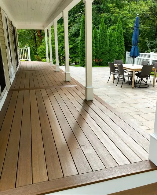 Finished covered porch with composite decking